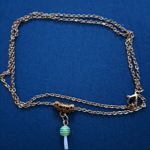 Elegant Gold Necklace with Green Pendant